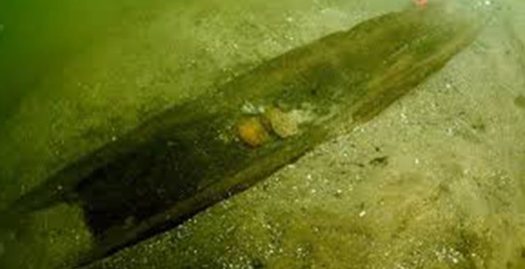 Underwater image of dugout canoe from Lake Mendota on June 6, 2021. (Courtesy: Tamara Thomsen - Wisconsin Historical Society)