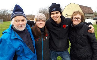 Photo by Xavier Kataquapit Mike McGrath on his many visits to Hagersville, Ontario to see his sister and her two grandchildren. From L-R are: Mike McGrath, Brynn Vokes, Jack Vokes and Mike’s sister Patty Bradley.