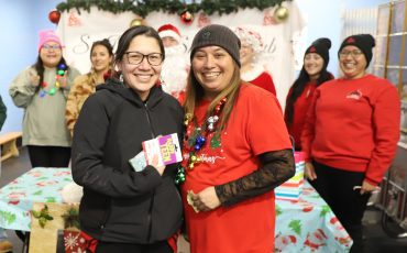 A $9,000 winning smile! The Six Nations Skating club was the big winner in their 50-50 draw held over the holidays raising over $18,000. But the largest smiles came when club president Rhonda Skye gave the biggest ticket seller Artie Martin and his wife Shyla (pictured) a nice $9.067.57 holiday prize! His wife Shyla accepted the prize. (Photo by Jim C. Powless)