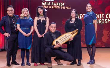 Scott Iserhoff (crouching) received the Indigenous Culinary Tourism Award at a ceremony in Edmonton this past week. Photo courtesy ITAC.
