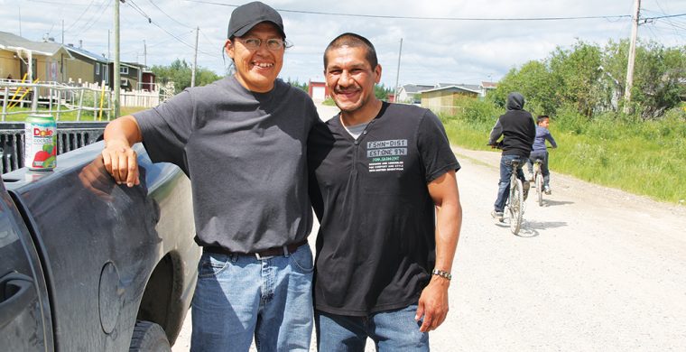Xavier Kataquapit with his childhood friend and cousin Joey Okimaw at their home community of Attawapiskat First Nation in 2016. (Photo by Xavier Kataquapit)