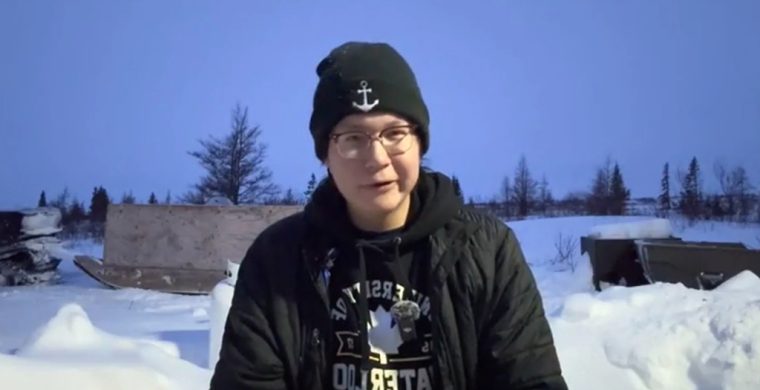 Jeronimo Kataquapit is the founder and leader of the ‘Here We Stand – Call To Action’ grassroots movement to protect the land in the James Bay territory. He is pictured here holding one of his live stream events from Nawashi River, a remote location 140 kms north of Attawapiskat on the James Bay coast. (Photo provided by Jeronimo Kataquapit)