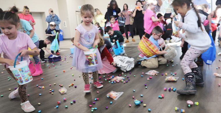 Ready, set and go! Grab those eggs! Six Nations recreation department’s annual Easter Egg hunt was a hit with egg hunters armed with baskets grabbing the sweet treats at the community hall. (Photo by Jim C. Powless)