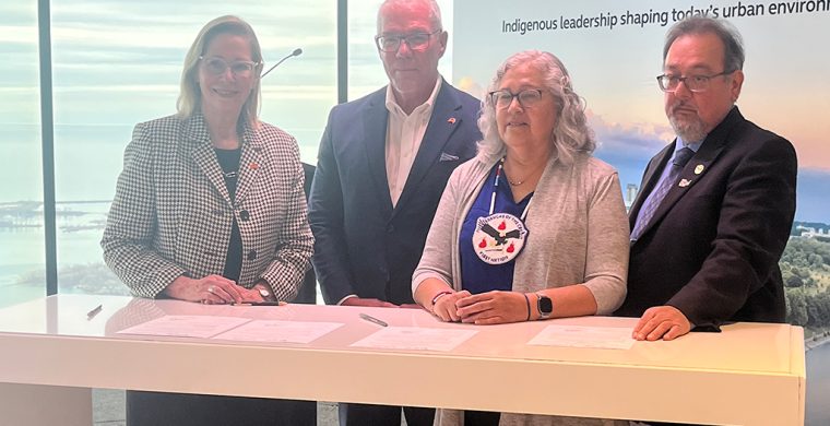 MCFN Chief Margaret Sault (second from right) and MCBC president/CEO Warren Sault (on right) joined Arcadis reps Audrey Jacobs and Scott Arbuckle for a partnership signing ceremony. Photo by Sam Laskaris.