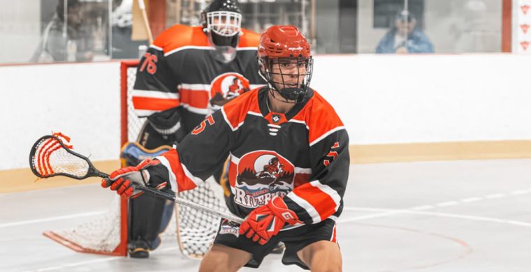 Six Nations Rivermen defender Ryan Andrews and goaltender Elan Henhawk helped their squad to a victory against Ennismore on Saturday. (Photo by Andrew VanEvery)