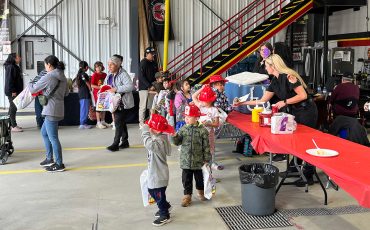 It was a busy Open House at the Six Nations Fire Department’s annual Community Awareness Event had children lining up to get their firefighter hats! (Photo byAlex Murray)