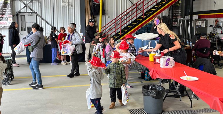 It was a busy Open House at the Six Nations Fire Department’s annual Community Awareness Event had children lining up to get their firefighter hats! (Photo byAlex Murray)