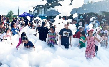 Okay Summer here we come! Ogwadeni:deo sent students off to a fun summer after a day of playing, dancing and partying in several feet of bubbly suds!. (Photo by Alex Murray. See more page 5 )