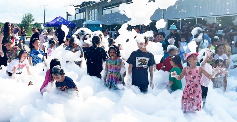 Okay Summer here we come! Ogwadeni:deo sent students off to a fun summer after a day of playing, dancing and partying in several feet of bubbly suds!. (Photo by Alex Murray. See more page 5 )