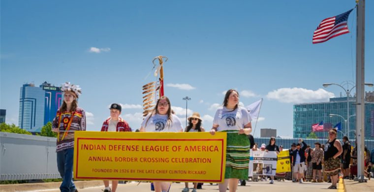 Over 100 people took to the Rainbow Bridge this past weekend to mark 99 years of Haudenosaunee border crossing rights. The 1794 Jay Treaty between the United States and Great Britain marks Indigenous rights to freely cross their international border. (Supplied Photo)