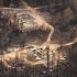 Wildfire damage is pictured from the air in Collins First Nation, a small, remote Ojibwa community located in northwestern Ontario, about 250 km north of Thunder Bay, Ont., on Wednesday, July 22, 2026. (THE CANADIAN PRESS/Chris Young)