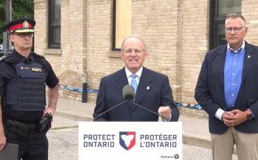 Brantford Police Chief Jason Saunders, Ontario Solicitor General Michael Kerzner and Brantford-Brant MPP Will Bouma outside the former Brantford Jail. (Photos by Alex Murray)