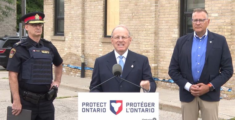 Brantford Police Chief Jason Saunders, Ontario Solicitor General Michael Kerzner and Brantford-Brant MPP Will Bouma outside the former Brantford Jail. (Photos by Alex Murray)