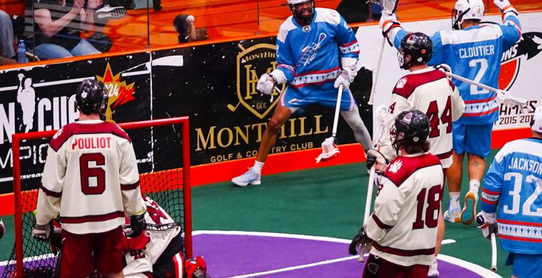 The Six Nations Chiefs in blue shirts, celebrate a goal in their series-clinching win over the Cobourg Kodiaks. (Photo by Darryl Smart.)