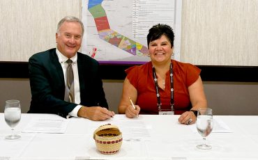 Brantford Mayor Kevin Davis and Six Nations Elected Chief Sherri-Lyn Hill signed a MOU over future land development at the Association of Municipalities of Ontario (AMO) conference in Ottawa (Supplied Photo)
