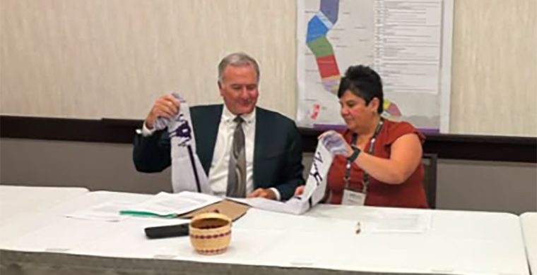 Brantford Mayor Kevin Davis and Six Nations Elected Chief Sherri-Lyn Hill signed a MOU over future land development at the Association of Municipalities of Ontario (AMO) conference in Ottawa where Elected Chief Hill presented Mayor Davis with a gift depicting the Two Row Wampum Treaty. (Supplied Photo)