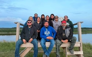 (Photo provided by Joseph Kataquapit) The Kattawapiskak Keekehwin Gathering committee are a dedicated group of volunteer community members who worked throughout the year to organize the 2026 event which was held from August 2 to 8, 2026. In back L-R are: Linda Kataquapit, Anna Keboke, Flora Iahtail, Lydia Linklater, Fiona Spence, Markiesha Sutherland, RoseAnne Sutherland and Jenny Hookimaw. In front L-R are: Xavier Rose, Joseph (Joojep) Kataquapit and Christopher Kataquapit.