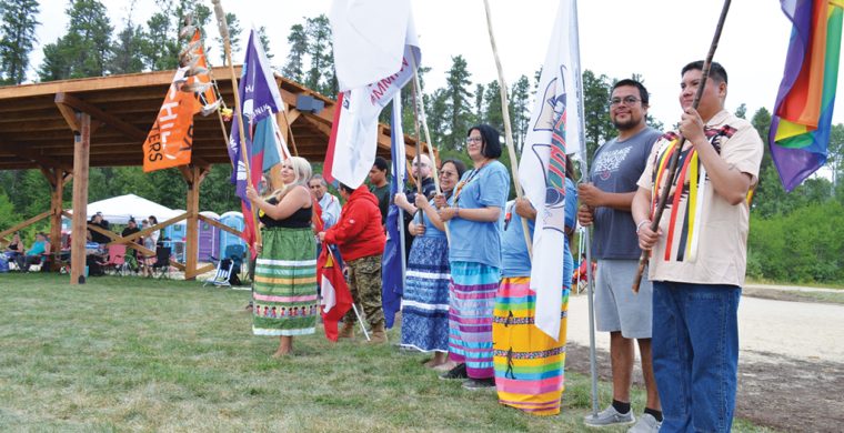The Mattagami FN 12th Annual Pow Wow was held on August 15 and 16, 2026. Pictured is Chief Jennifer Constant, Mattagami FN (in the green dress) leading the flag bearers for the opening of the first day of the Pow Wow on Saturday August 15. (Photo by X Kataquapit)