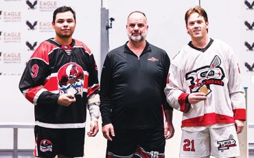 Marshall Powless, on left, was the Six Nations Rivermen player of the game in their quarter-final loss to Ladner Pioneers last Thursday. (Photo courtesy Presidents Cup)