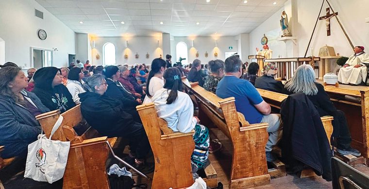 The New St Francis Xavier Church in Attawapiskat FN was opened on August 25, 2026. The community is pictured here during the opening ceremony and consecration of the new church. (Photo by Rosie Koostachin)