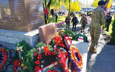 Six Nations marked its annual Remembrance Day ceremonies Sunday, Oct. 18, at the Veterans Park Cenotaph (Photo by Jim C. Powless) See more ... page 5.